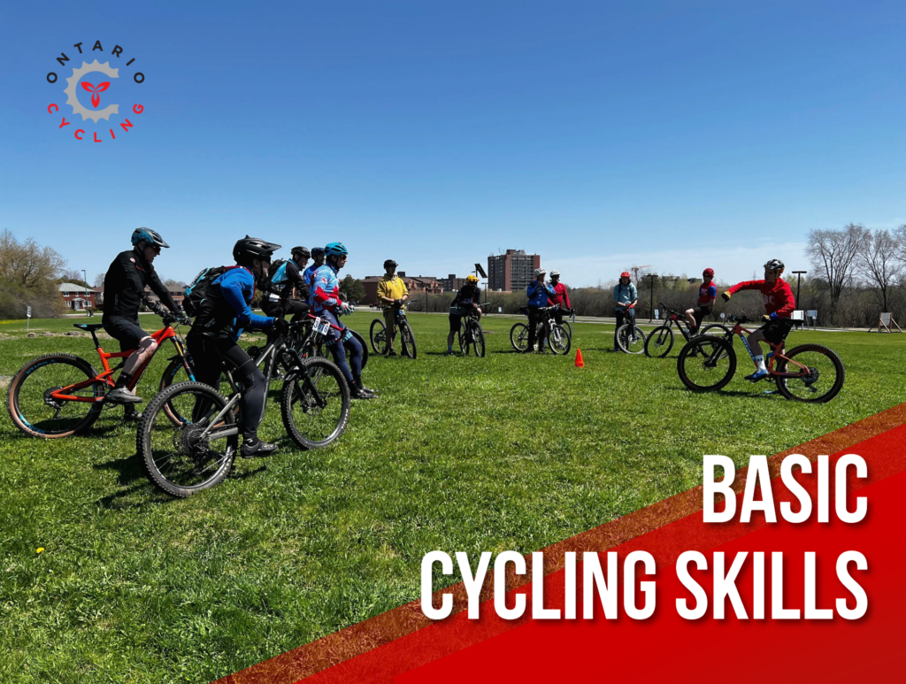 Group of riders going over next instructions towards leader on left side of image. Words "Basic Cycling Skills"