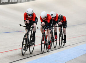 4 team ontario riders ride the track in unison