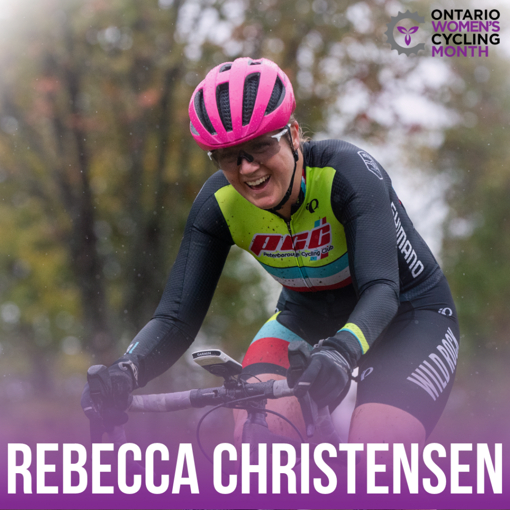 A woman in full cycling kit, helmet and sunglasses riding past the camera smiling, graphic reads Rebecca Christensen