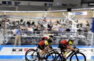 Youth Attack Racing cyclists cross the finish line at the velodrome